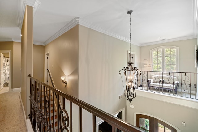 125 Millbury Ln, Eads, TN 38028 - corridor with an upstairs landing, ornamental molding, carpet, an inviting chandelier, and baseboards