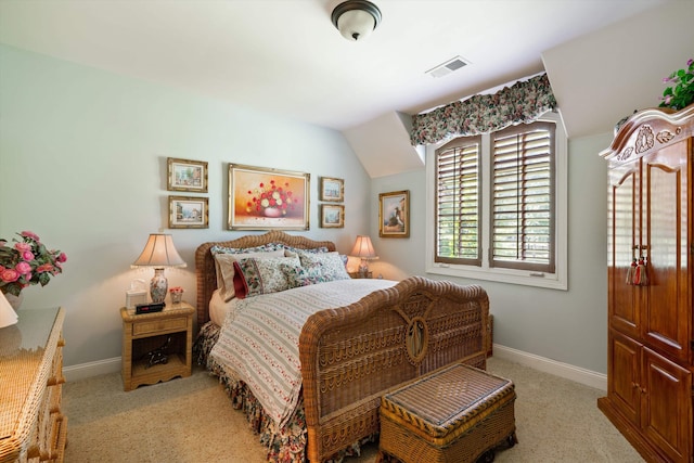 125 Millbury Ln, Eads, TN 38028 - bedroom featuring visible vents, baseboards, lofted ceiling, and light carpet