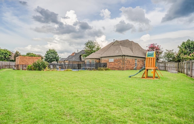 view of yard with a playground