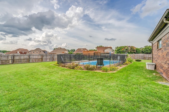 view of yard featuring a fenced in pool