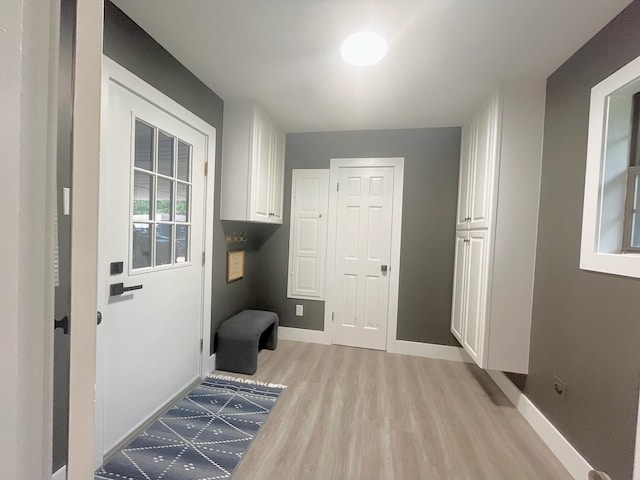 mudroom with light wood-type flooring