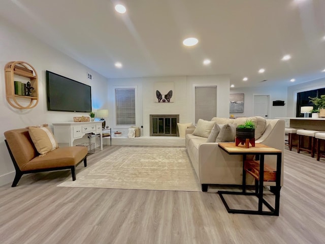 living room with light hardwood / wood-style floors