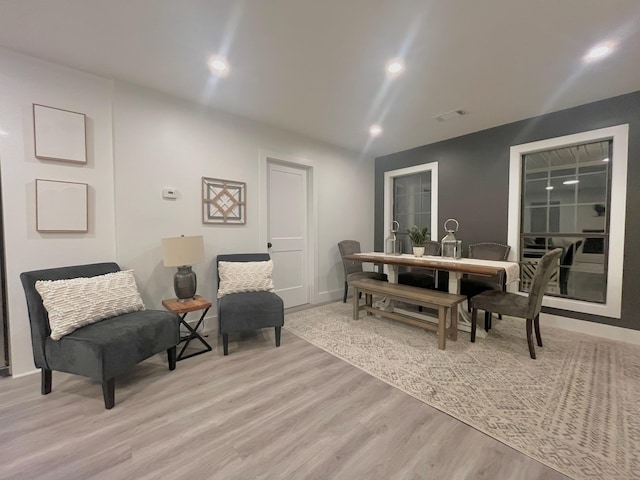 sitting room with light hardwood / wood-style flooring