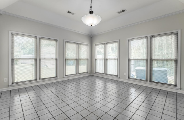 unfurnished sunroom with a raised ceiling