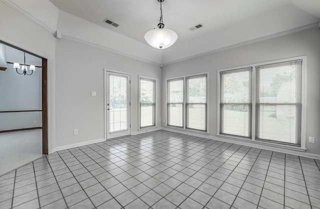 unfurnished room featuring light tile patterned flooring, visible vents, and baseboards