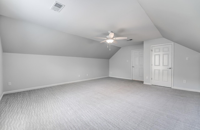 bonus room featuring carpet flooring, visible vents, ceiling fan, and baseboards