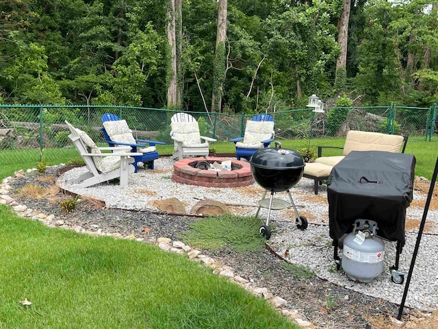 exterior space with an outdoor fire pit