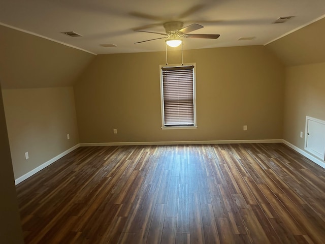 bonus room featuring ceiling fan, dark hardwood / wood-style floors, and vaulted ceiling