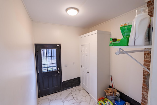 entrance foyer featuring crown molding