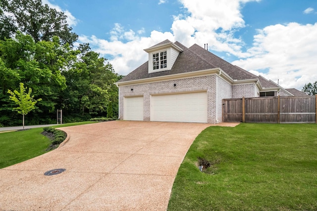 view of home's exterior with a yard