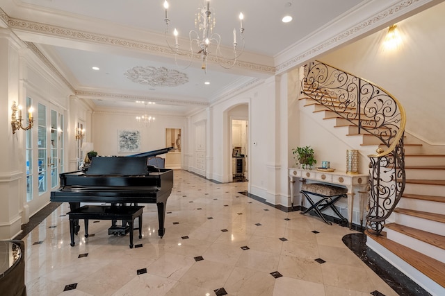 miscellaneous room featuring an inviting chandelier, ornamental molding, and french doors