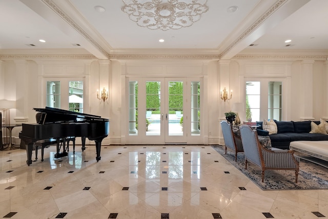 interior space with crown molding and french doors