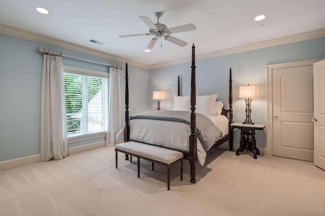 bedroom featuring light carpet, crown molding, and ceiling fan