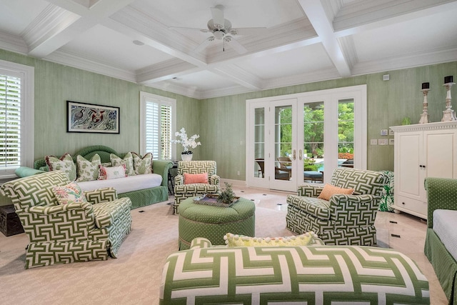 living room with french doors, a healthy amount of sunlight, coffered ceiling, and beamed ceiling