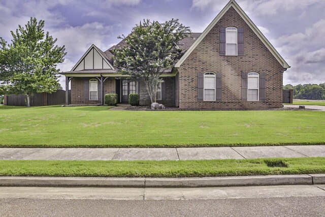 view of front of property with a front lawn