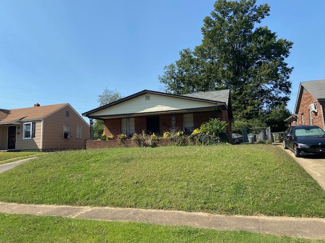 ranch-style home with a front yard