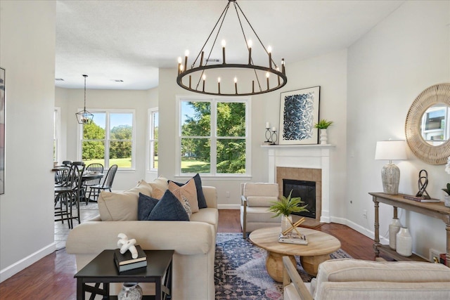 living room with hardwood / wood-style flooring and a fireplace