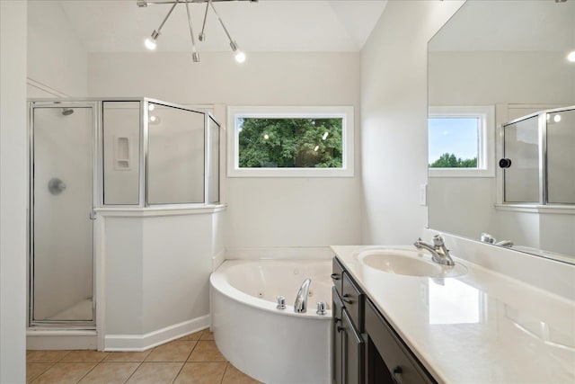 bathroom featuring vanity, tile patterned floors, and plus walk in shower