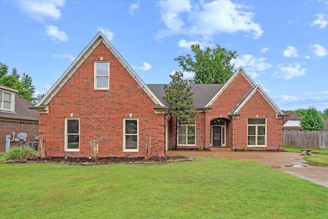 view of property with a front lawn