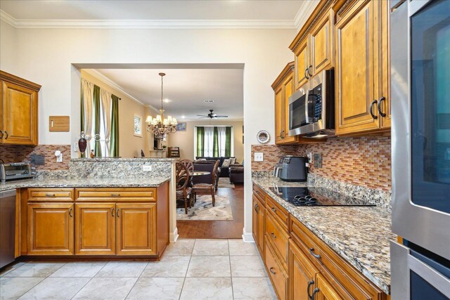 kitchen featuring light hardwood / wood-style flooring, ceiling fan with notable chandelier, appliances with stainless steel finishes, decorative backsplash, and ornamental molding