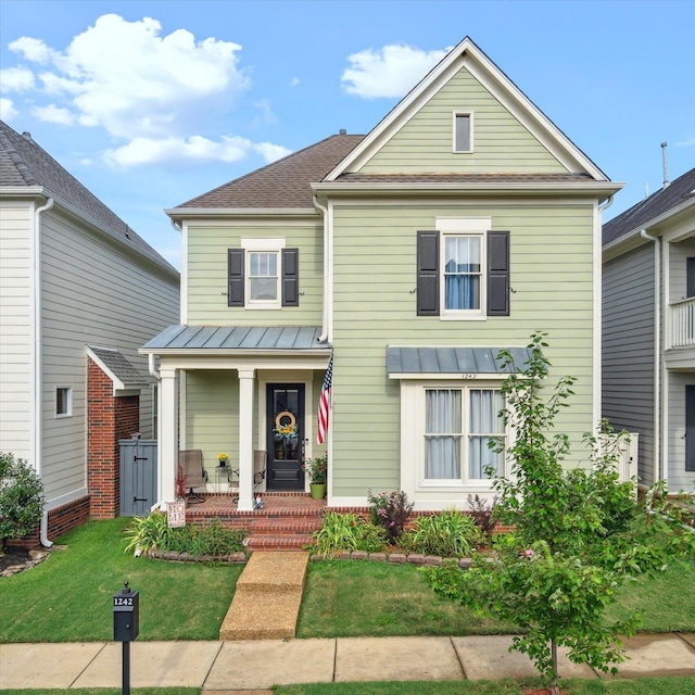 view of front of house with a front lawn