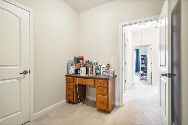 home office with attic access, baseboards, and light colored carpet