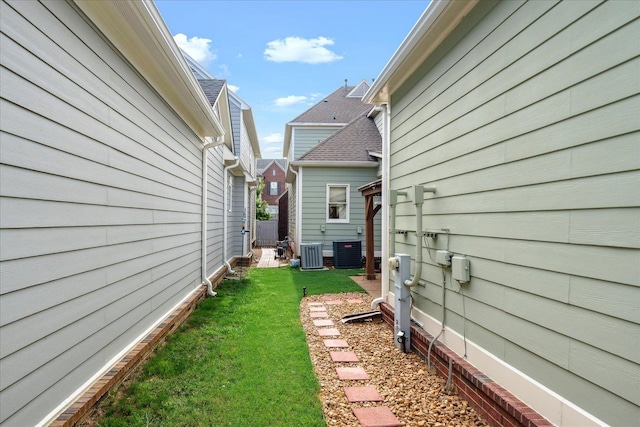 view of yard with central AC unit