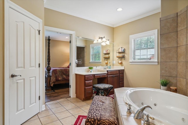 bathroom with crown molding, vanity, tiled bath, and tile patterned flooring