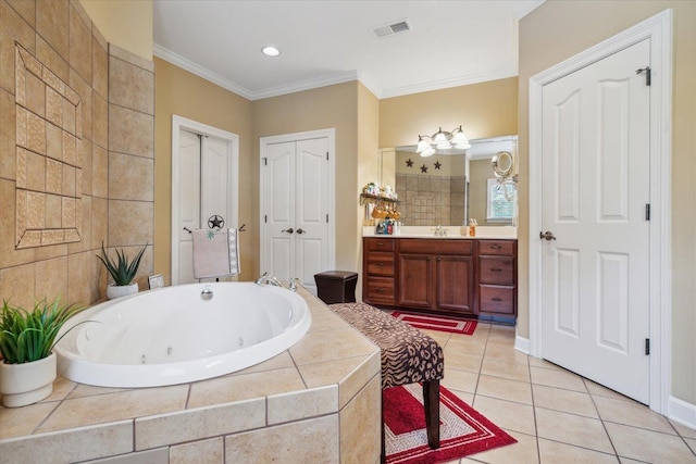 bathroom featuring crown molding, tile patterned floors, tiled bath, and vanity