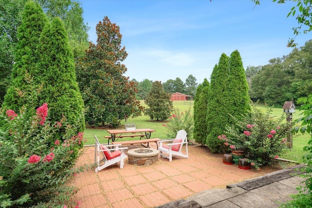 view of patio / terrace with a fire pit