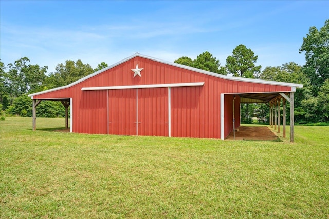 view of outdoor structure with a yard