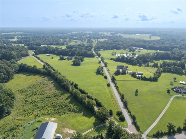 birds eye view of property featuring a rural view