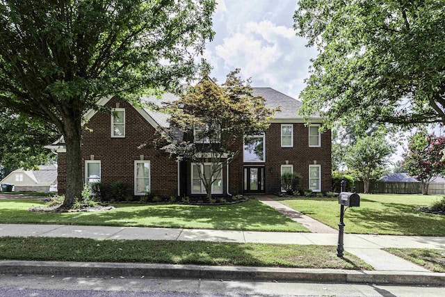 view of front facade with a front lawn