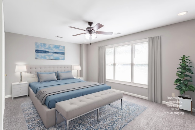 carpeted bedroom featuring ceiling fan