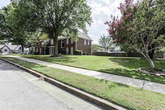 view of front of home with a front yard