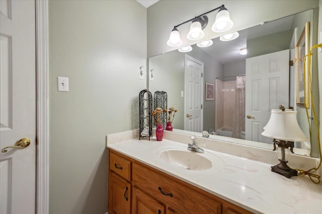 full bath with shower / bathtub combination with curtain, vanity, and toilet