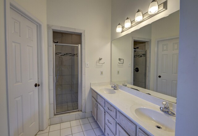 full bathroom with tile patterned flooring, toilet, vanity, and shower / bath combo with shower curtain