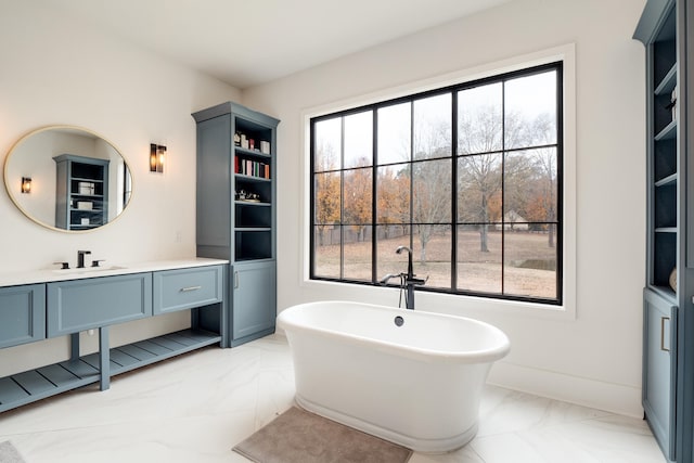 bathroom featuring a healthy amount of sunlight and tile patterned flooring