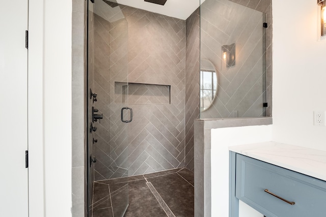 bathroom with vanity and an enclosed shower