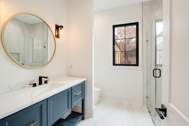 bathroom featuring a shower with shower door, vanity, tile patterned floors, and toilet