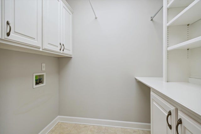 laundry room with cabinets and hookup for a washing machine