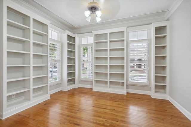 spacious closet with ceiling fan and wood-type flooring