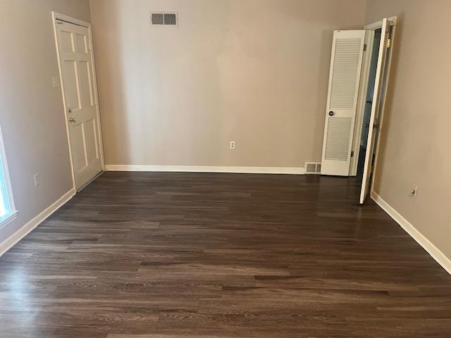 unfurnished bedroom with carpet and a textured ceiling