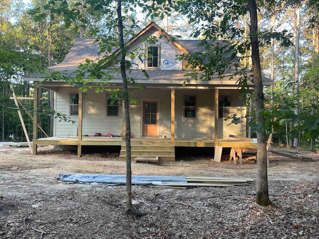 view of front of property featuring covered porch