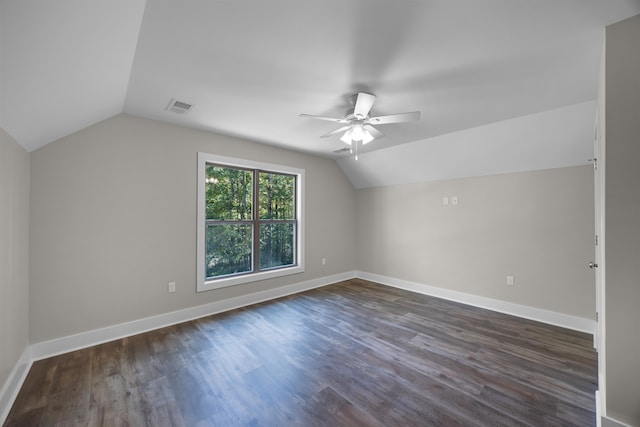 bonus room with lofted ceiling, ceiling fan, and dark hardwood / wood-style flooring