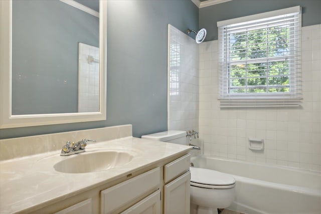 full bathroom with vanity, tiled shower / bath combo, toilet, and crown molding