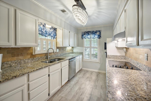 kitchen featuring black electric cooktop, white cabinetry, stainless steel dishwasher, sink, and backsplash