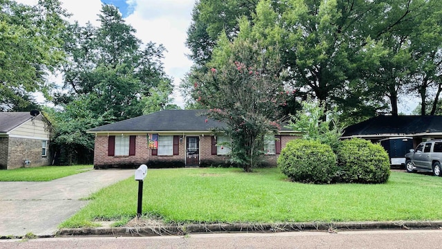 view of front of home with a front yard