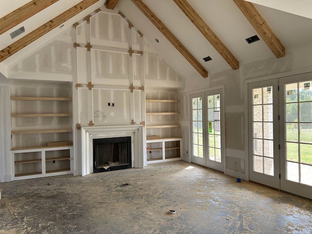 unfurnished living room with beam ceiling, high vaulted ceiling, french doors, and built in shelves