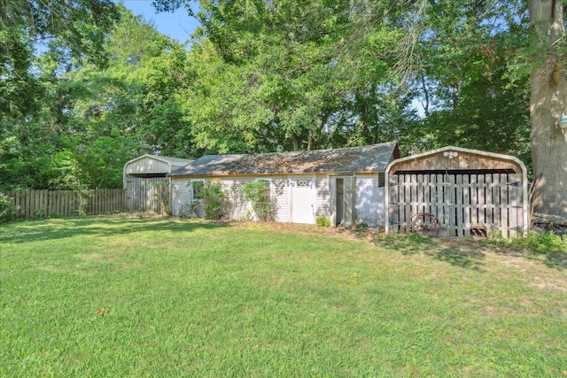 view of yard with a carport